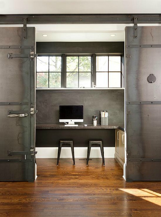 office-black-chalkboard-walls-desk-under-window-double-metal-doors