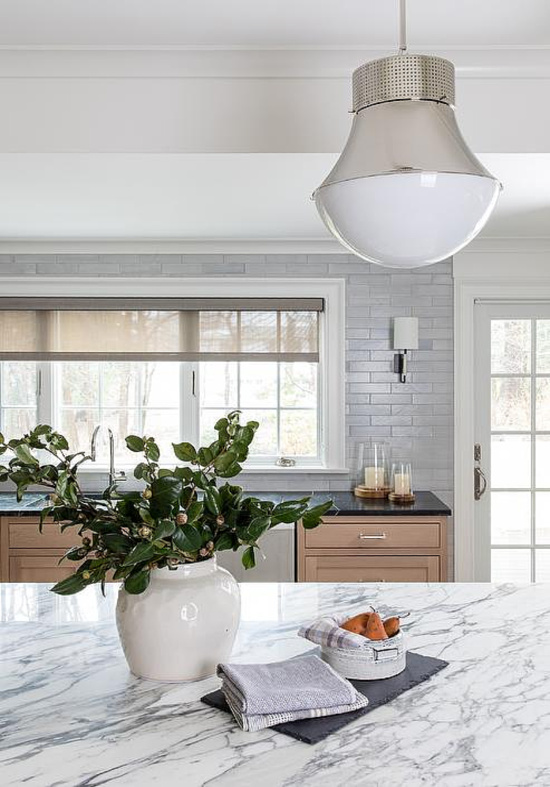 precision-pendants-over-white-and-gray-marble-top-island