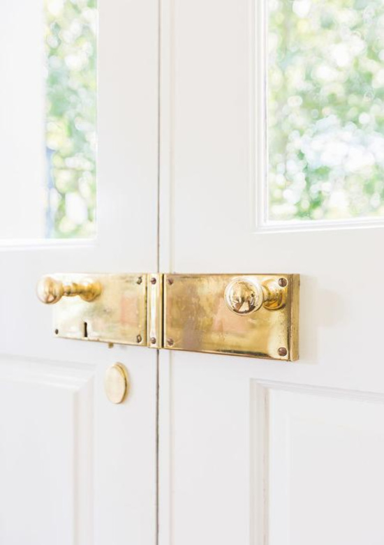 double-front-doors-polished-brass-knobs