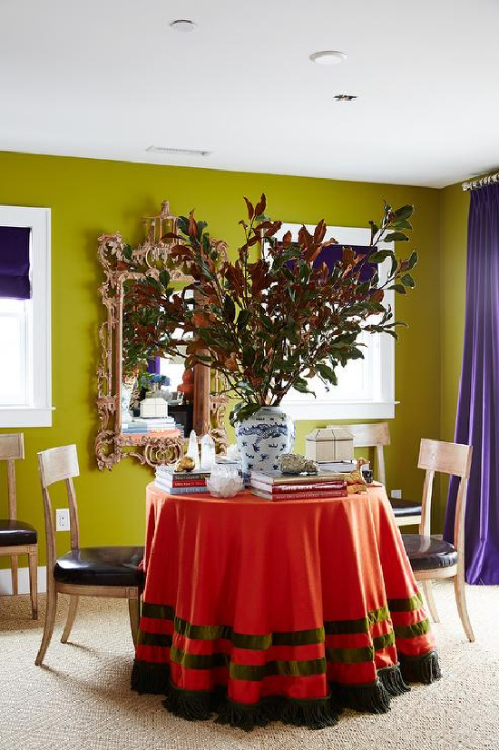 round-orange-and-green-skirted-table