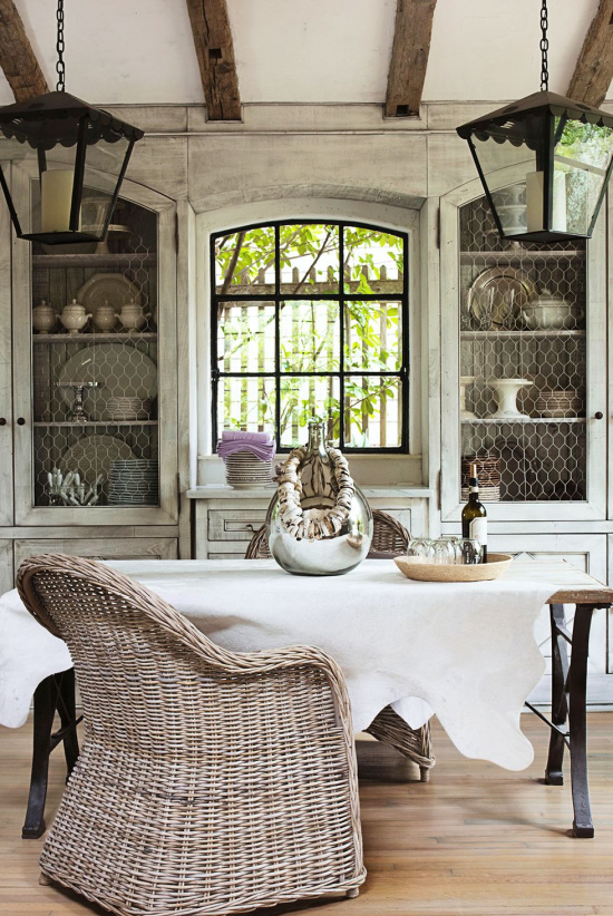 french-country-kitchen-lanterns-iron-table-wicker-chairs