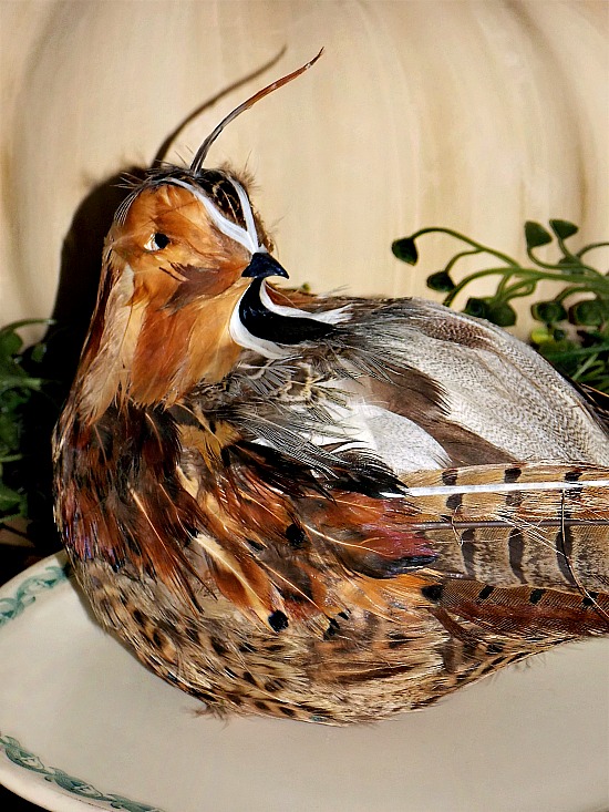 quail-feather-figurine