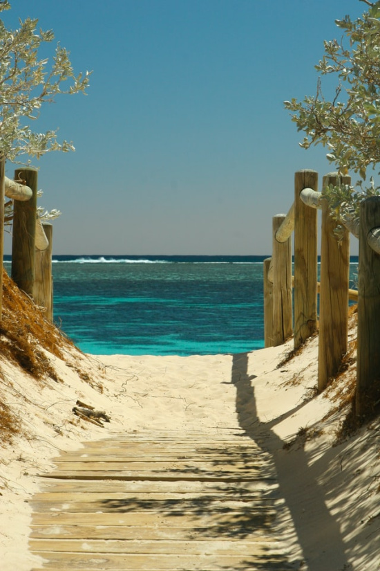 sandy-beach-blue-green-waters-chris-galbraith-unsplash