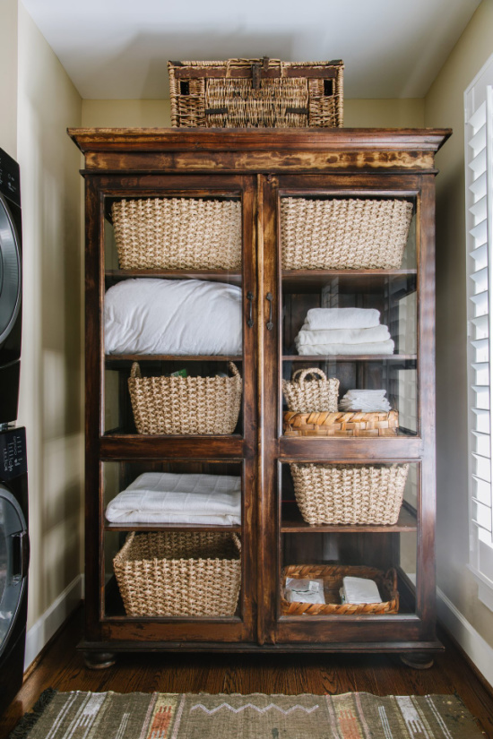 vintage-armoire-linens-laundry-room