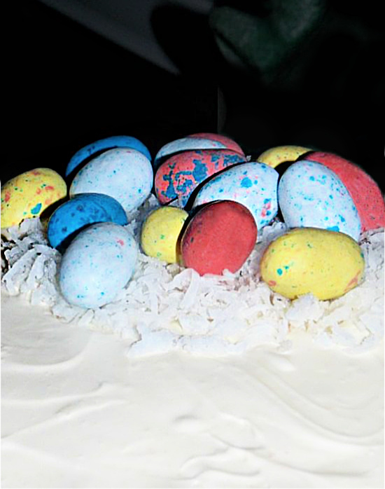 coconut-cake-speckled-malt-balls-topping